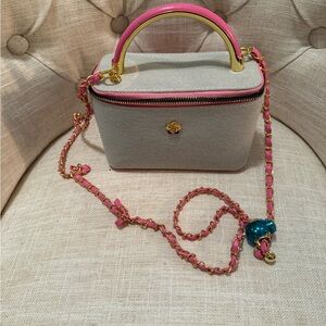 Stylish light blue and pink vanity crossbody.